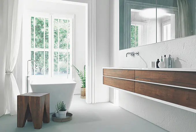 Modernisiertes Bad mit freistehender Wanne und Waschtisch